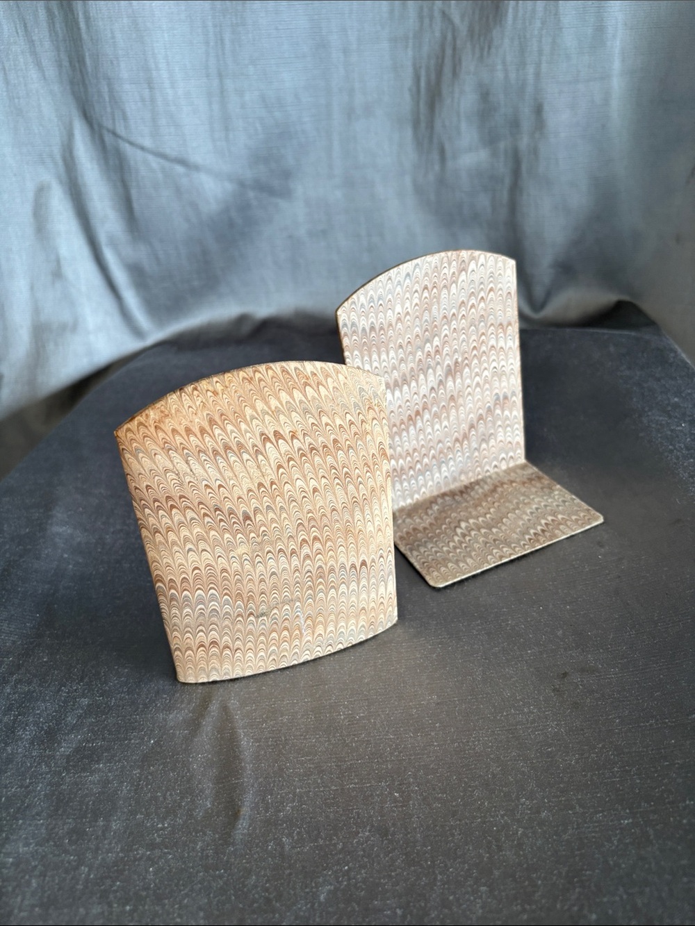 Set of 2 marble paper wood wrapped bookends.